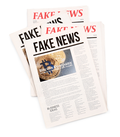 Newspapers on white backgroundの写真素材