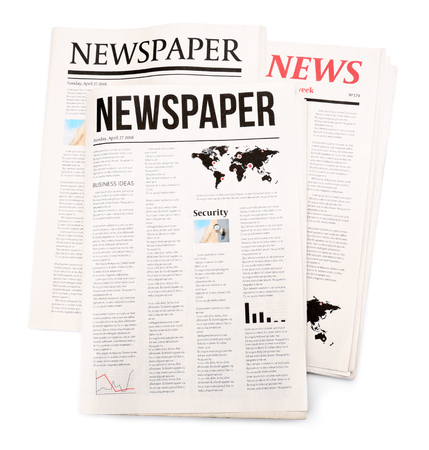 Newspapers on white backgroundの写真素材