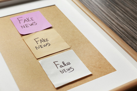 Stickers with words FAKE NEWS in frame, closeupの写真素材
