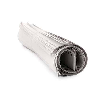 Rolled newspaper on white backgroundの写真素材
