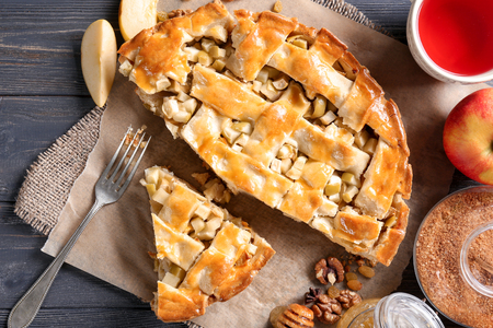 Tasty homemade apple pie on wooden tableの写真素材