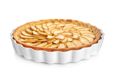 Dish with tasty homemade apple pie on white backgroundの写真素材