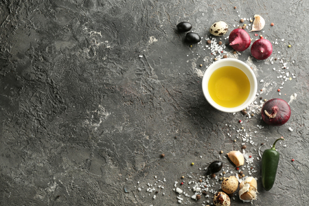 Composition with olive oil on grey background, top viewの写真素材