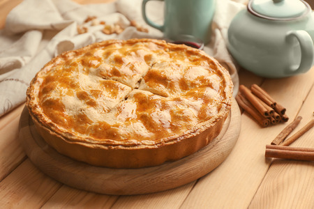 Tasty homemade apple pie on wooden tableの写真素材