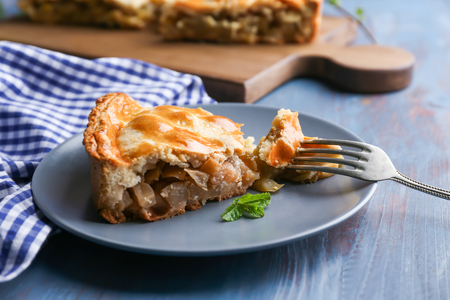 Piece of tasty apple pie on plateの写真素材