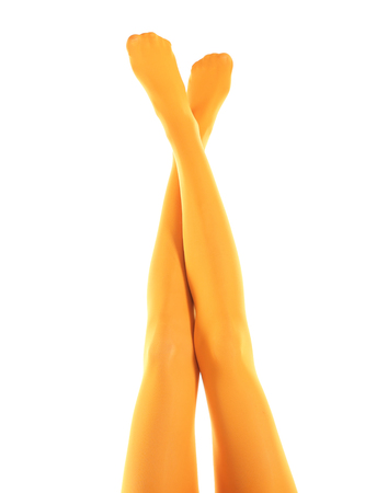 Legs of beautiful young woman in tights on white backgroundの写真素材