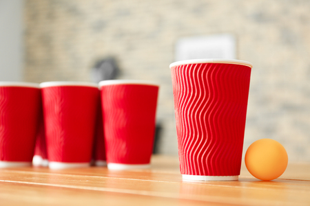 Set for beer pong game on tableの写真素材