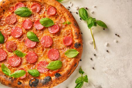 Tasty pepperoni pizza on tableの写真素材