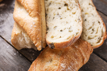 Fresh tasty bread on wooden table, closeupの写真素材
