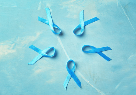 Blue ribbons on color background. Prostate cancer conceptの写真素材