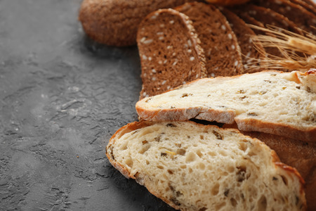 Slices of fresh tasty bread on table