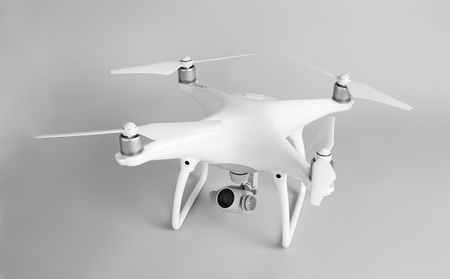 Modern quadcopter on grey backgroundの写真素材