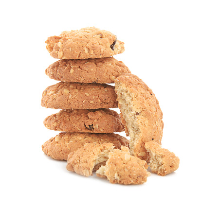 Stack of delicious oatmeal cookies on white background
