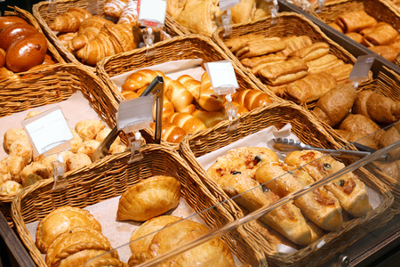 Fresh tasty bakery in wicker basketsの写真素材