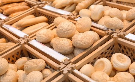 Tasty fresh bakery with sesame seeds in shopの写真素材