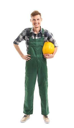 Young male electrician with hardhat on white backgroundの写真素材