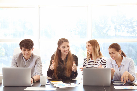 Meeting of business team working in office