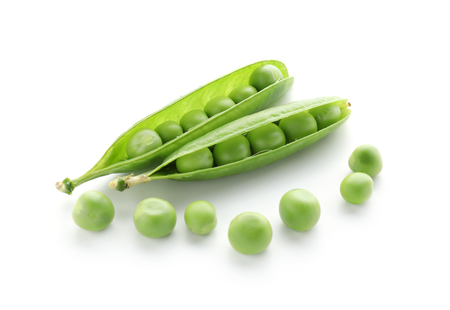 Pods with fresh green peas on white backgroundの写真素材