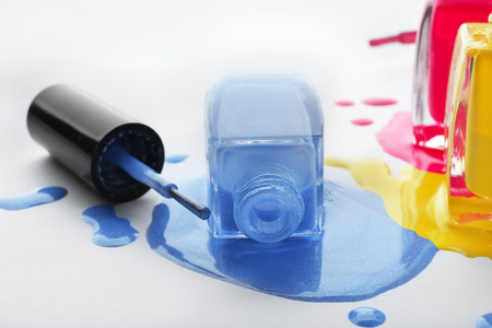 Open bottle of nail polish on white background, closeupの写真素材