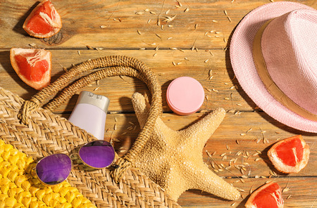 Composition with travel items on wooden background