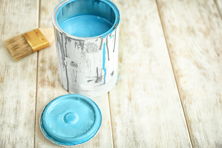 Can of paint on wooden backgroundの写真素材