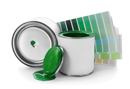 Cans of paint and color samples on white backgroundの写真素材