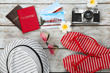 Composition with travel accessories on wooden backgroundの写真素材