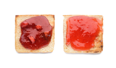 Toasts with tasty strawberry jam on white backgroundの写真素材