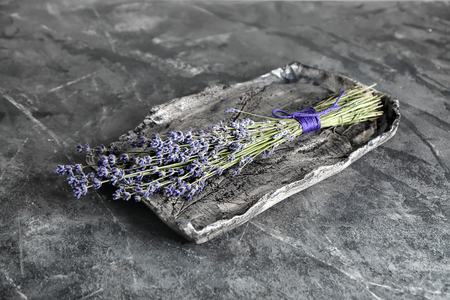 Tray with beautiful lavender on grey tableの写真素材