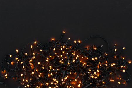 Festive Christmas garland on dark backgroundの写真素材