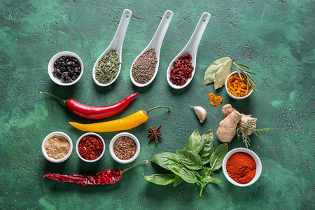 Composition with different spices on color backgroundの写真素材