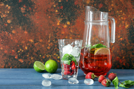 Composition with tasty strawberry lemonade on tableの写真素材