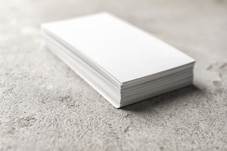 Blank business cards on light background