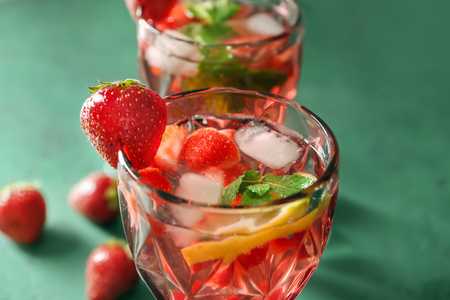 Tasty natural lemonade with strawberries in glasses on table, closeupの写真素材