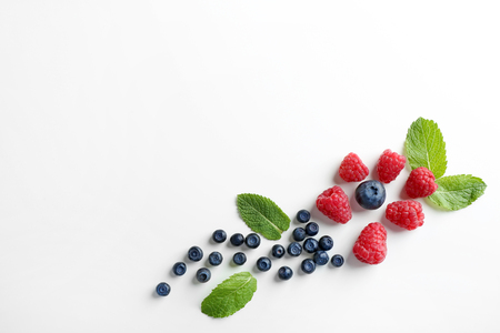 Delicious ripe berries on white background, top viewの写真素材