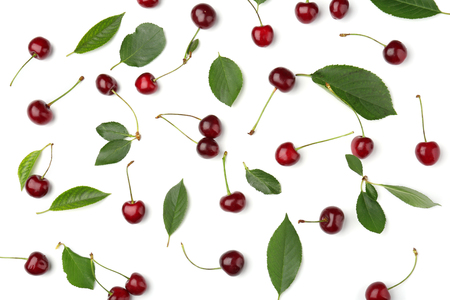 Ripe cherries with leaves on white backgroundの写真素材