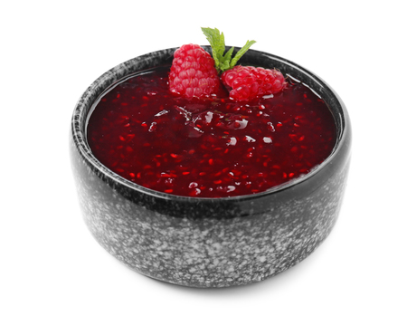 Bowl with raspberry jam on white backgroundの写真素材