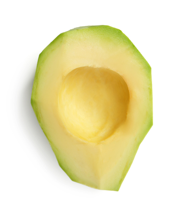 Half of peeled avocado on white backgroundの写真素材