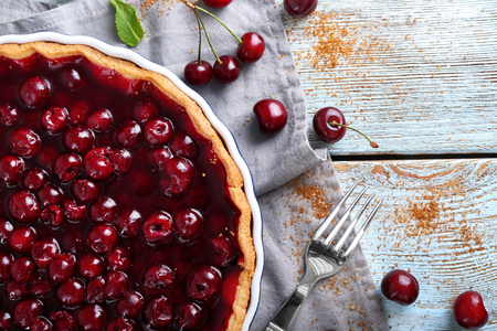 Tasty cherry pie on wooden tableの写真素材