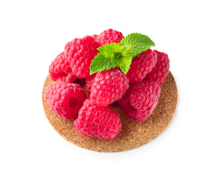 Delicious fresh ripe raspberries on white background