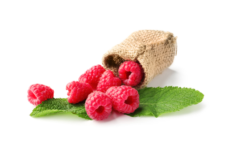 Delicious fresh ripe raspberries on white background
