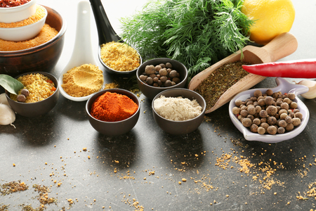 Composition with different spices on grey backgroundの写真素材