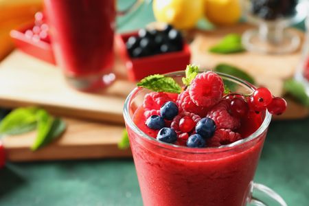 Glass with tasty berry smoothie, closeupの写真素材