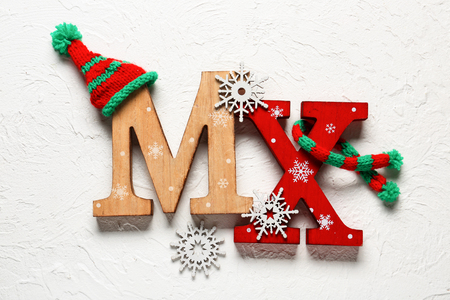 Christmas composition with letters MX on white textured backgroundの写真素材