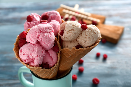 Waffle cones with tasty raspberry ice-cream in cupの写真素材