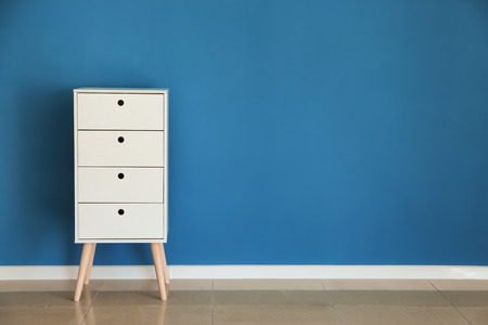 Cabinet near color wallの写真素材