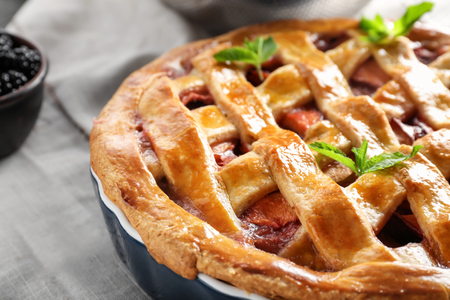 Delicious peach pie on table, closeupの写真素材