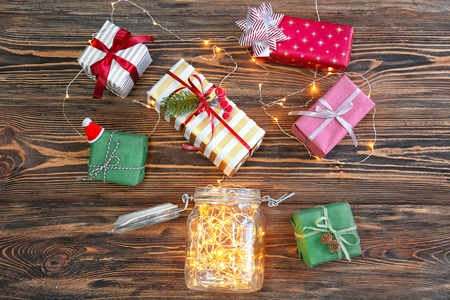 Composition with Christmas gifts on wooden backgroundの写真素材