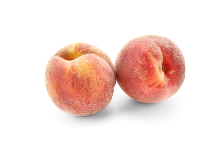 Fresh peaches on white backgroundの写真素材