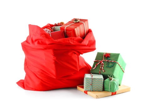 Santa Claus bag full of gifts on white backgroundの写真素材